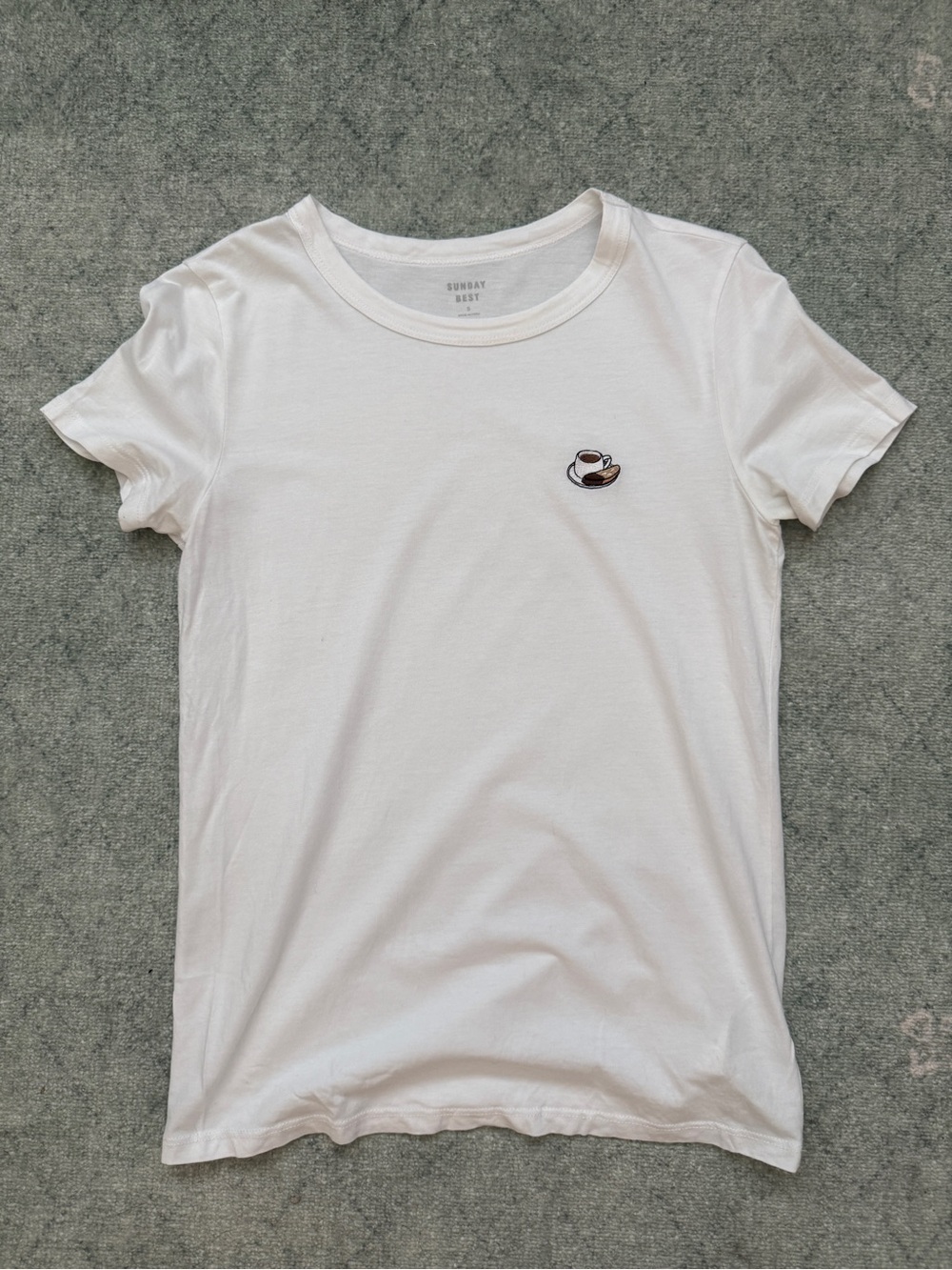 Aritzia Sunday Best white t-shirt with small embroidered coffee cup and biscotti
